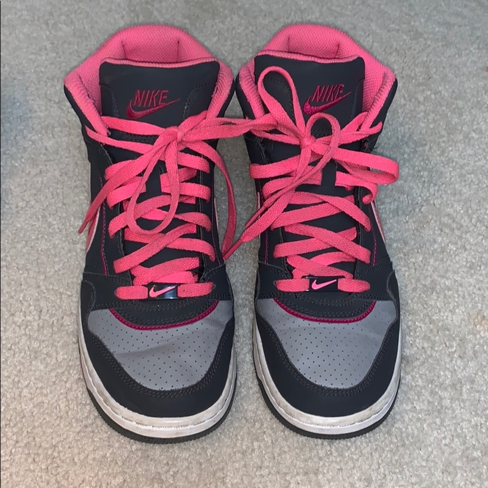 Pink and gray Nike high tops